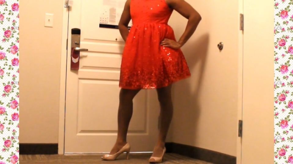 A 1950's SISSY DANCE FOR HER HUSBAND WEARING A PARTY DRESS