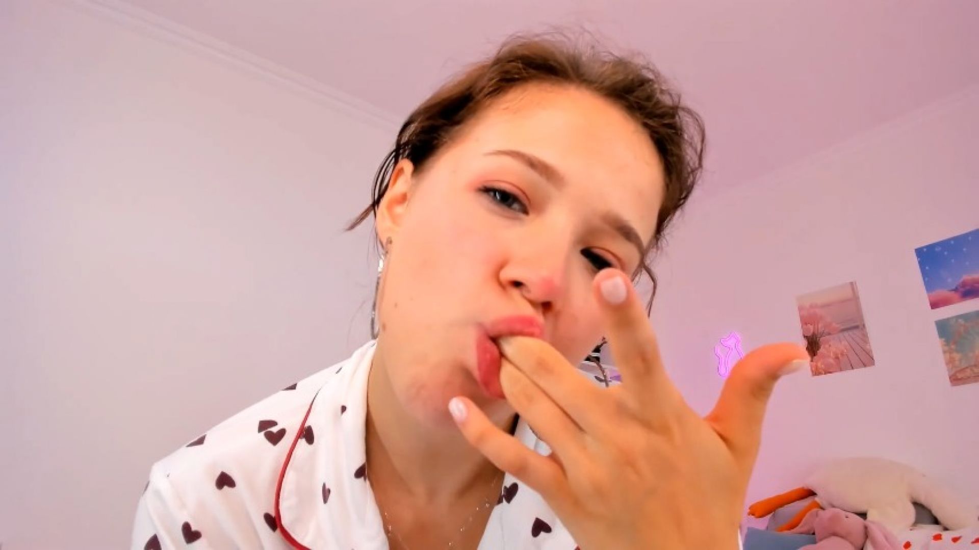 Licking and sucking fingers