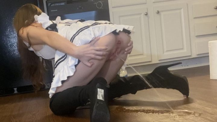 Desperate Maid Pisses On The Floor And Gets Caught