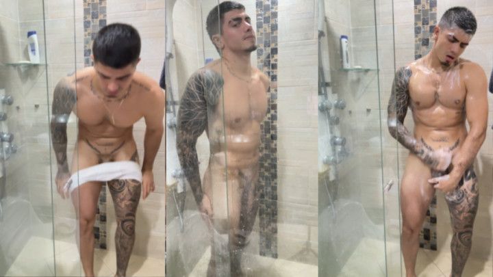 Great orgasm in the shower for young guy with tattoos