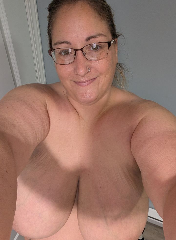 Massive tits get covered in cum