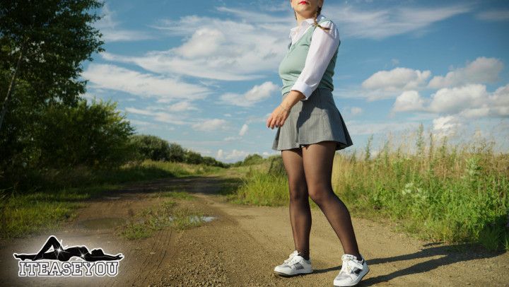 58 ITEASEYOU legs in pantyhose and miniskirt, outdoors