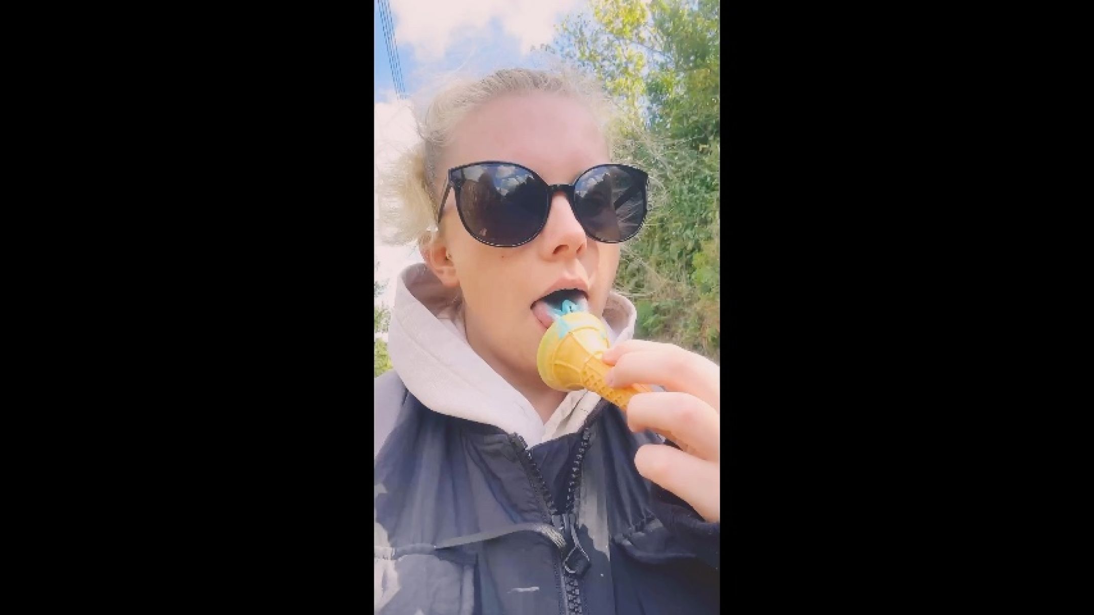 Eating &amp; licking a bubblegum ice cream while on a walk