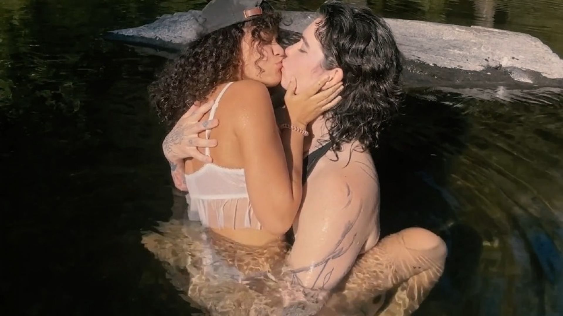 Passionate makeout in the river