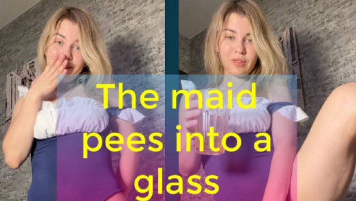 The maid pees into a glass