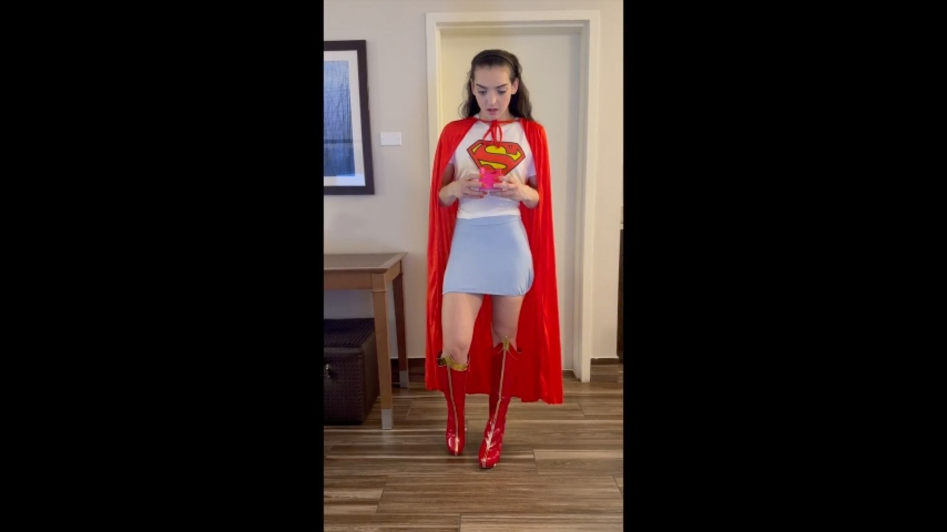 Supergirl vs Brainiac cosplay with tons of up skirt shots