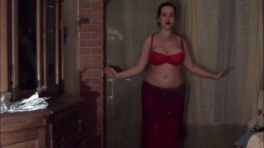 A mesmerizing belly dance in red outfit