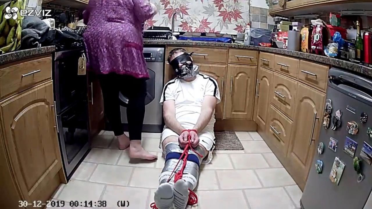 Miss M uses a duct taped and roped up man