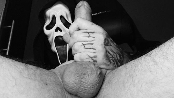 Ghostface stroking his oiled up cock