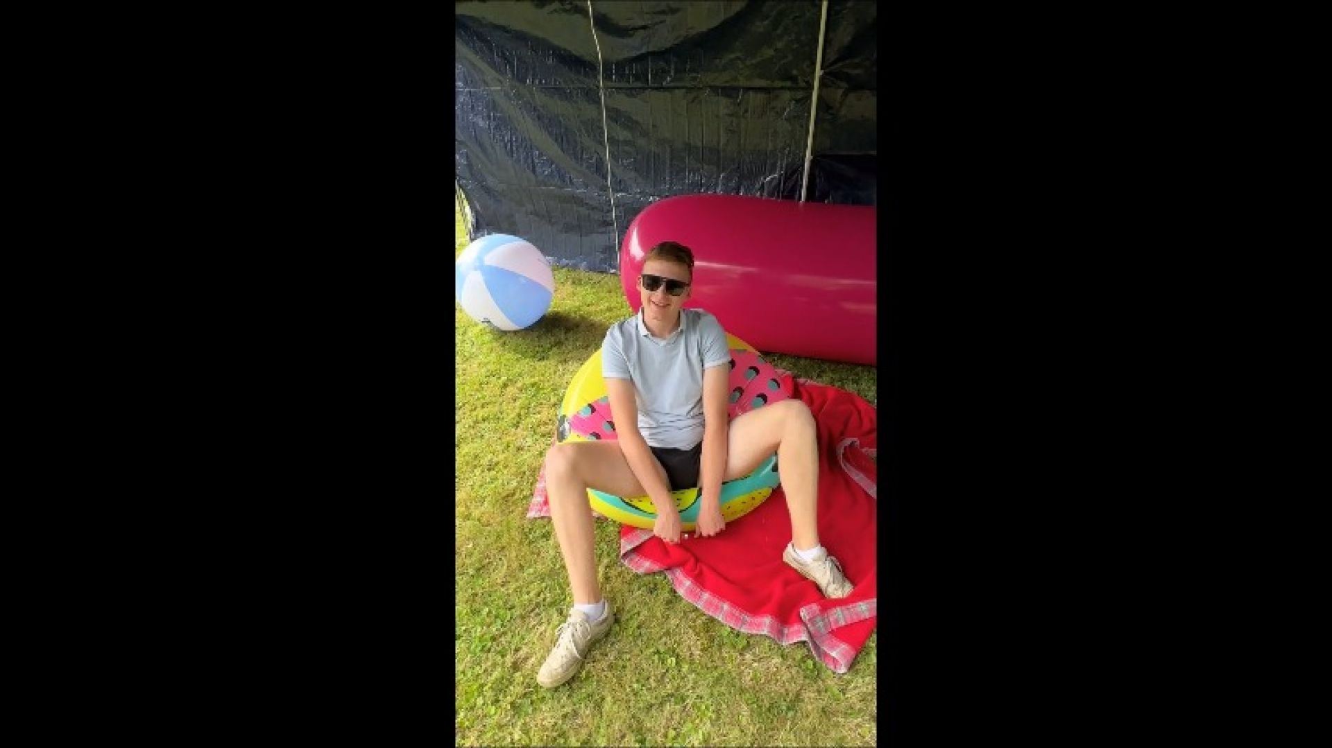 Lukas Popping some Inflatable in Garden