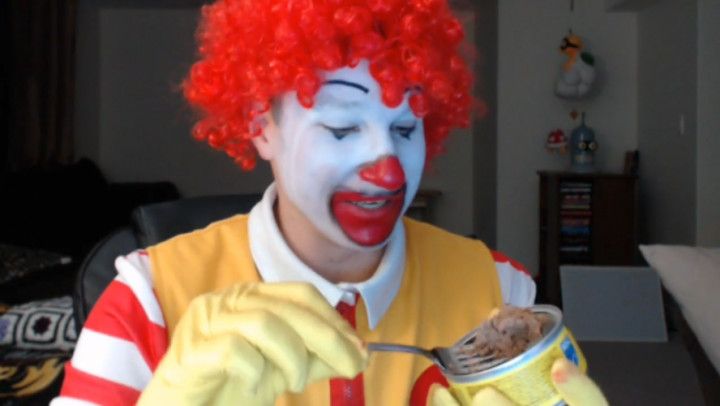 Ronald McDonald eats catfood live camshow