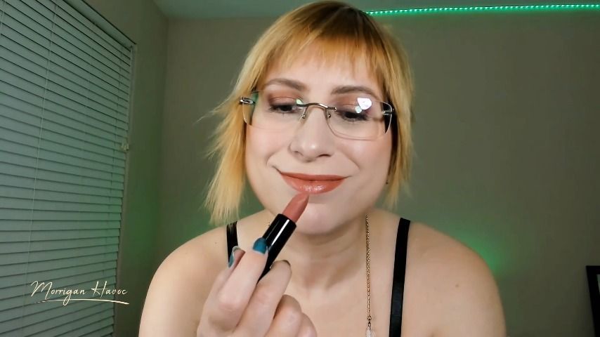 Applying Beige Nude Lipstick in Lingerie