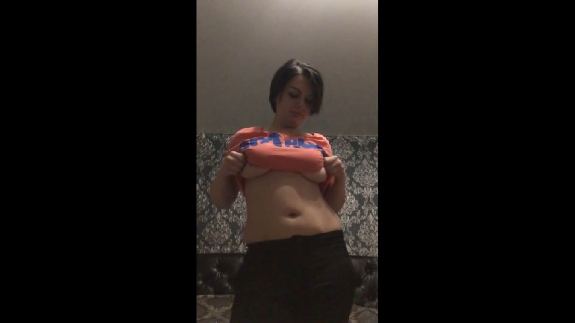 Boobs jumping out from t-shirt in slow motion