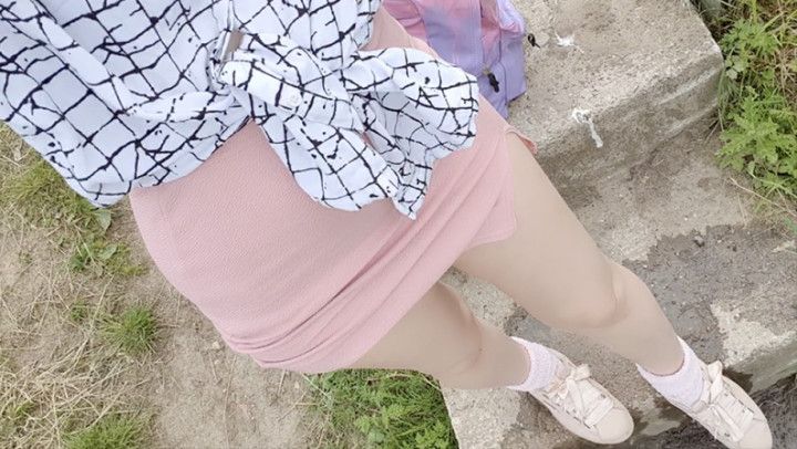 Pink skirt and blue panties outdoor pee