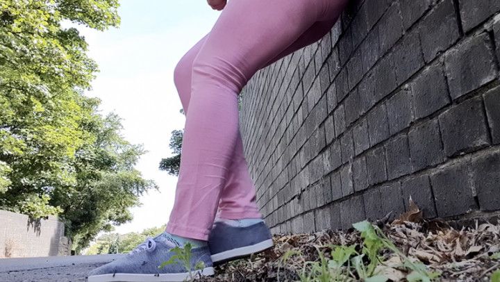 Pink leggings wetting peeing by the road