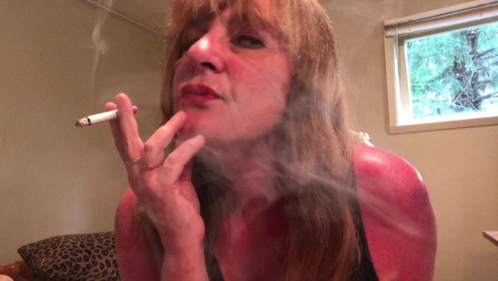 Sexy red mouth sultry smoking