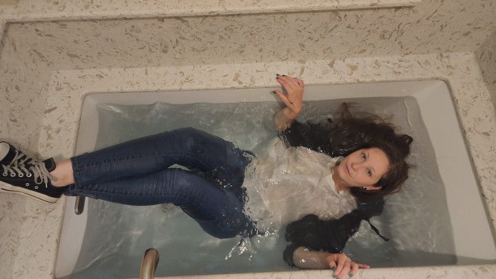 Converse and jeans in the tub