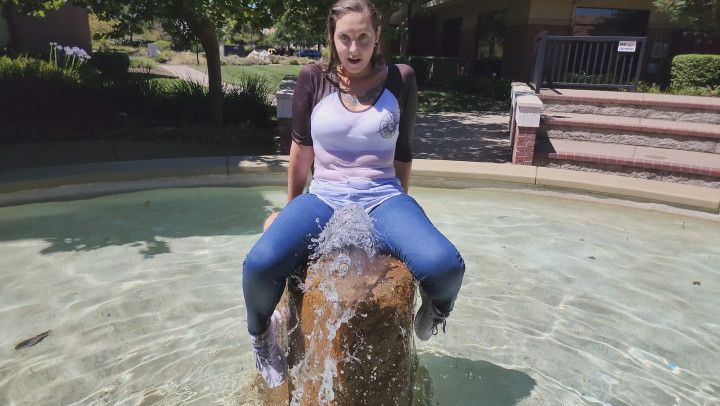 Nikes and Jeans in the fountain
