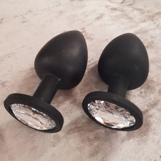 Pair of large black jewelled butt plugs