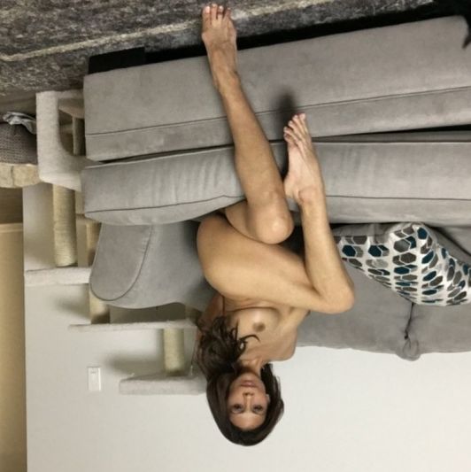 Cassandra Cruz nude and cross legged