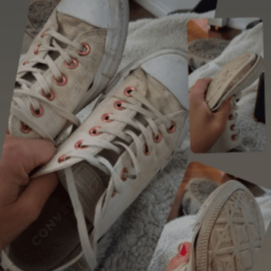 well worn dirty Converse sneakers