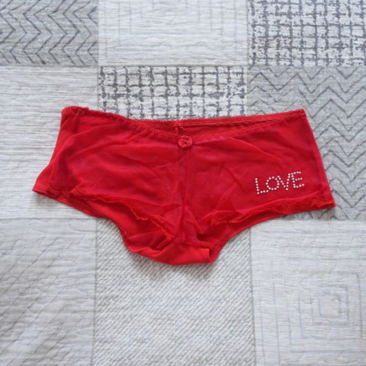 Red hipsters wiht mesh front and inscription LOVE