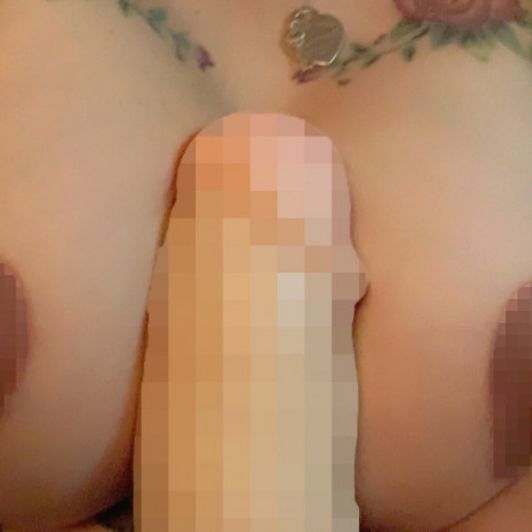 Titty fuck with huge dildo