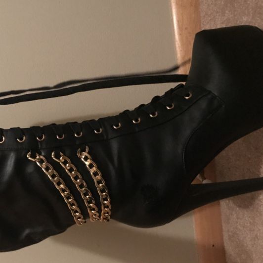 Black and gold boots