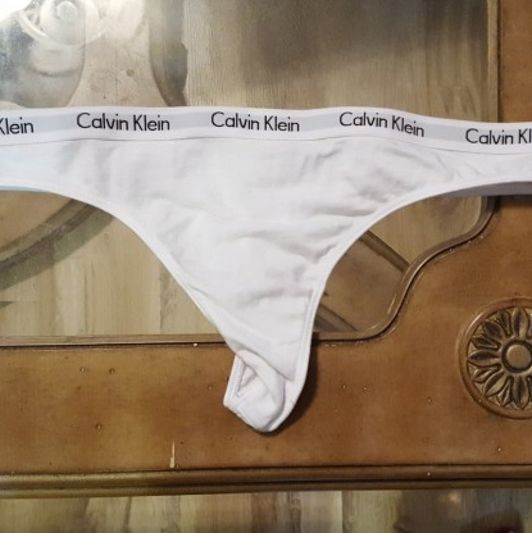 White Calvin Klein thong
