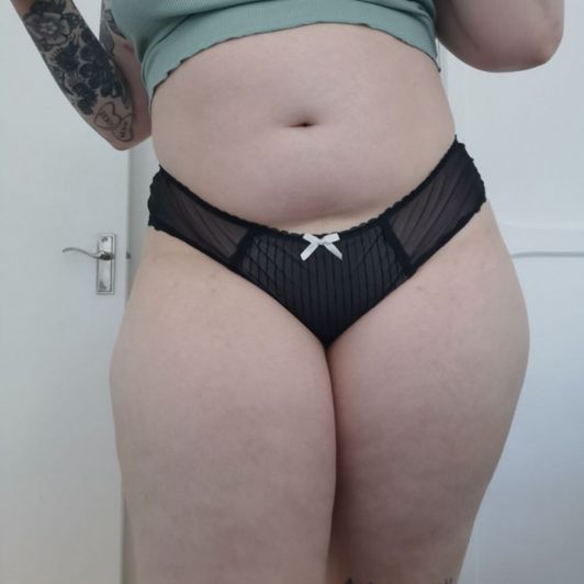 Black panties with cream bow and decor