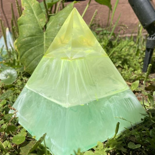 Psychedelic pistachio calcite pyramid
