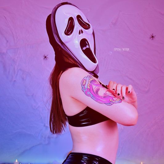 Oiled ghostface in a sexy leather lingerie