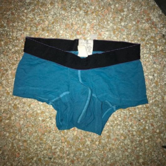 Worn out blue underwear with black waist
