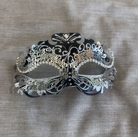 Autographed black and silver mask
