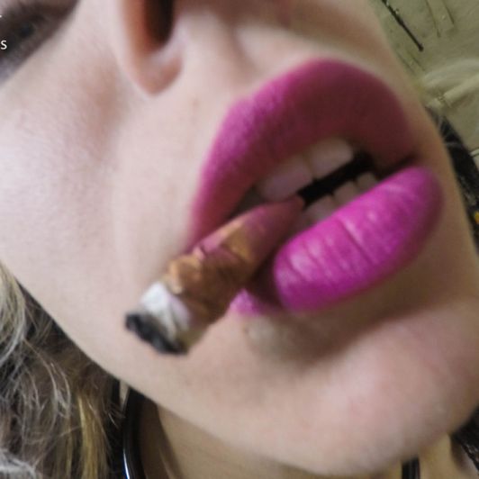 Three Cigarette Butts with Lipstick