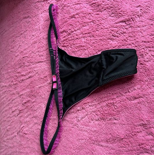 Black string pink bow tie