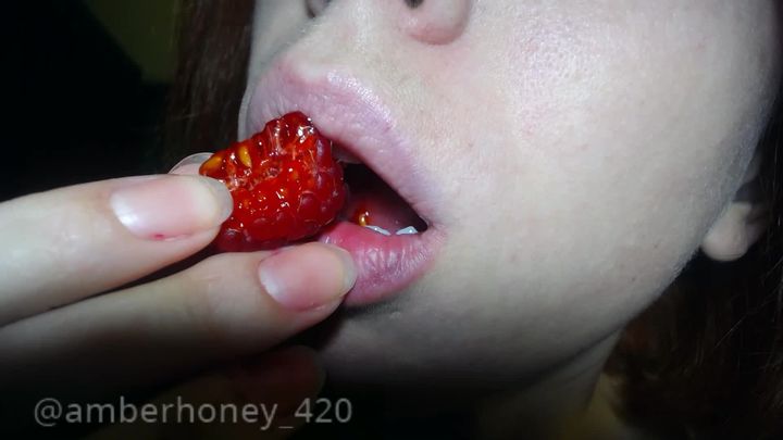 Bare Lips Eating Raspberry