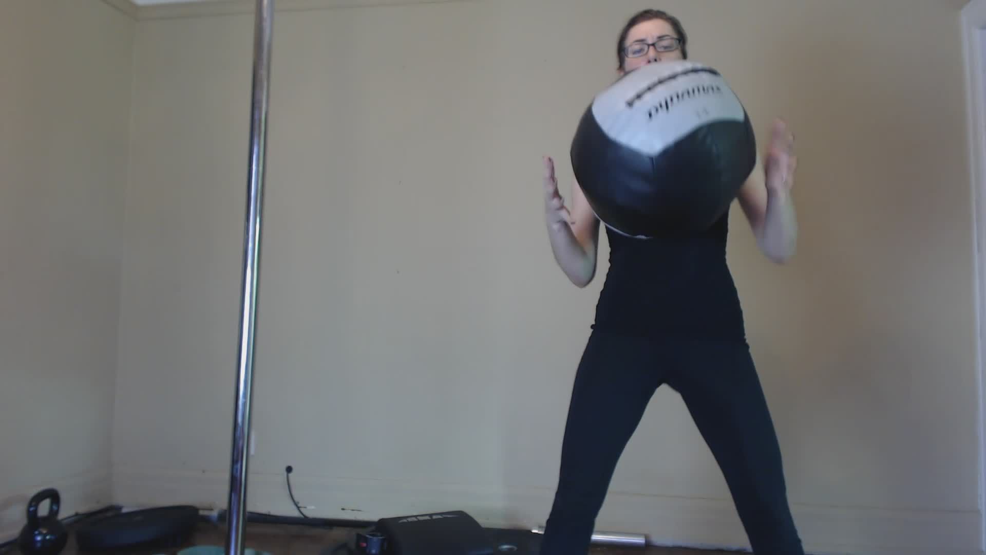Sammy squats with 14 pound medicine ball