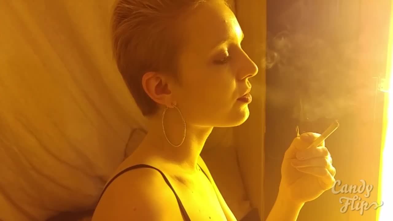Smoking in half-transparent lingerie