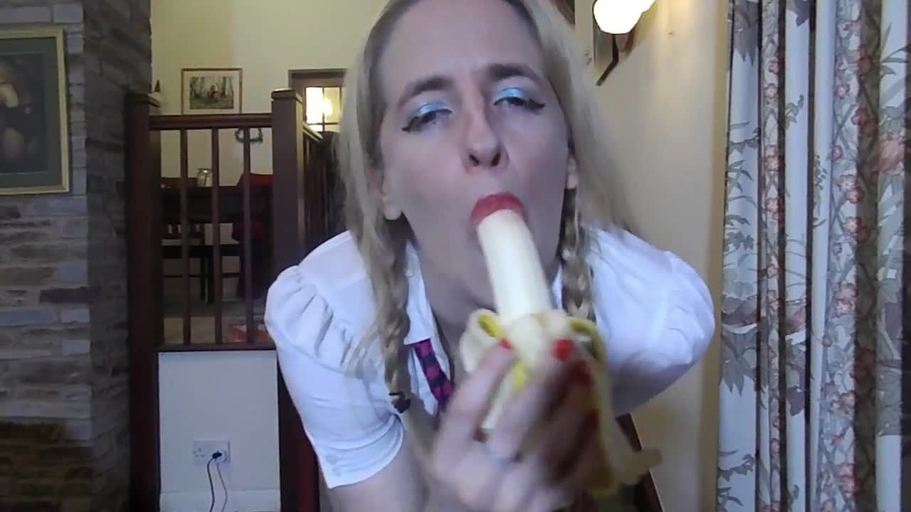 Slutty Schoolgirl plays with banana