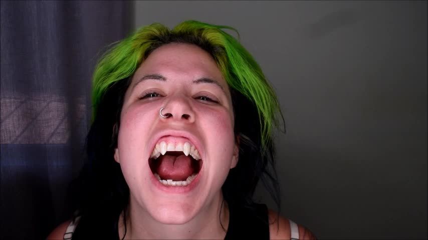 Showing off my VAMPIRE FANGS
