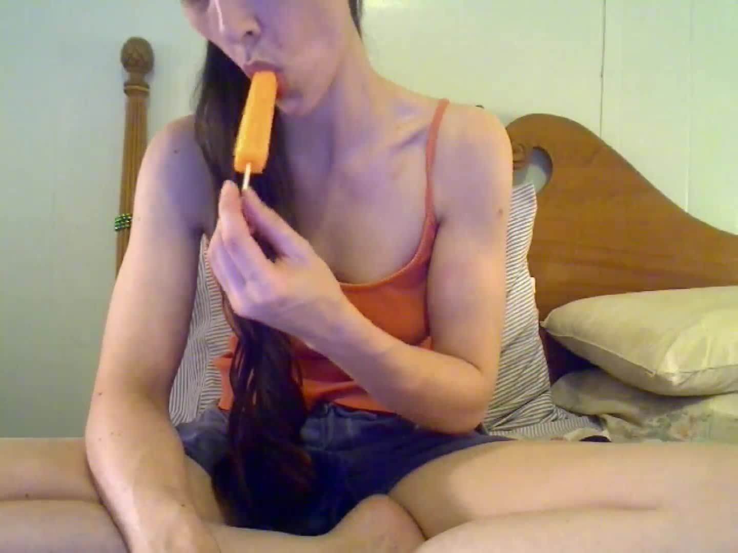 sucking and consuming an icepop