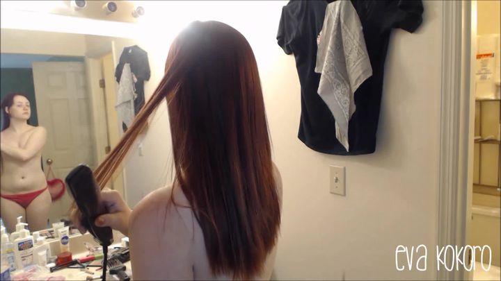 Straightening and brushing my red hair
