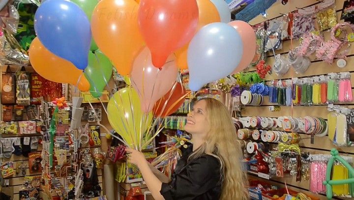 Katya Inflating Balloons With Helium