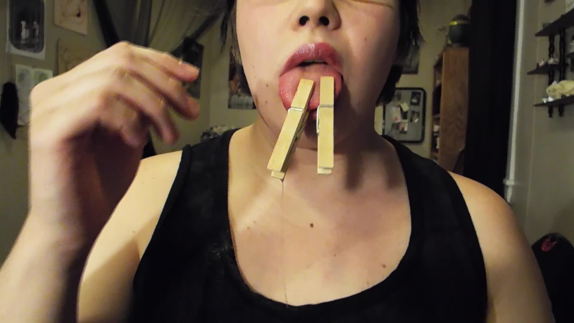Playing With Spit Clothespins On Tongue