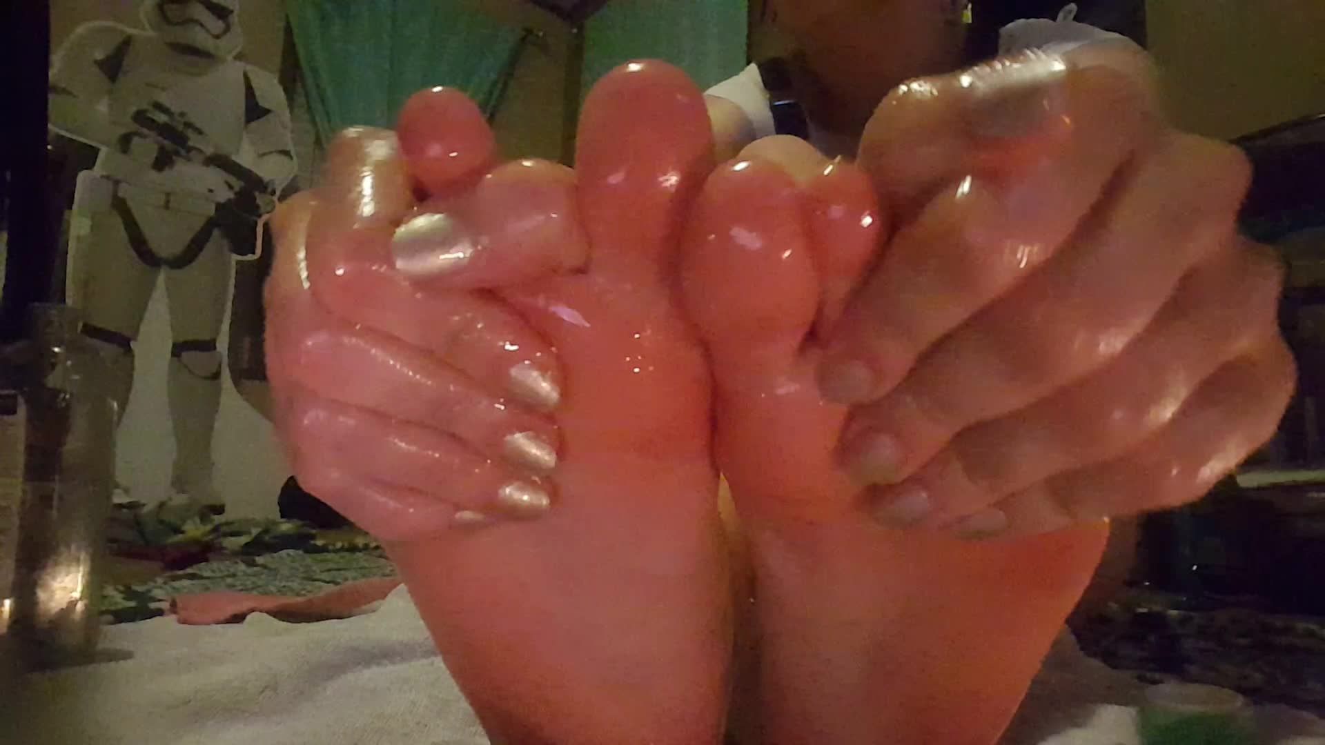 School girl oils up feet