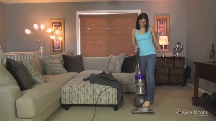 Vacuuming in Jeans and Tank Top