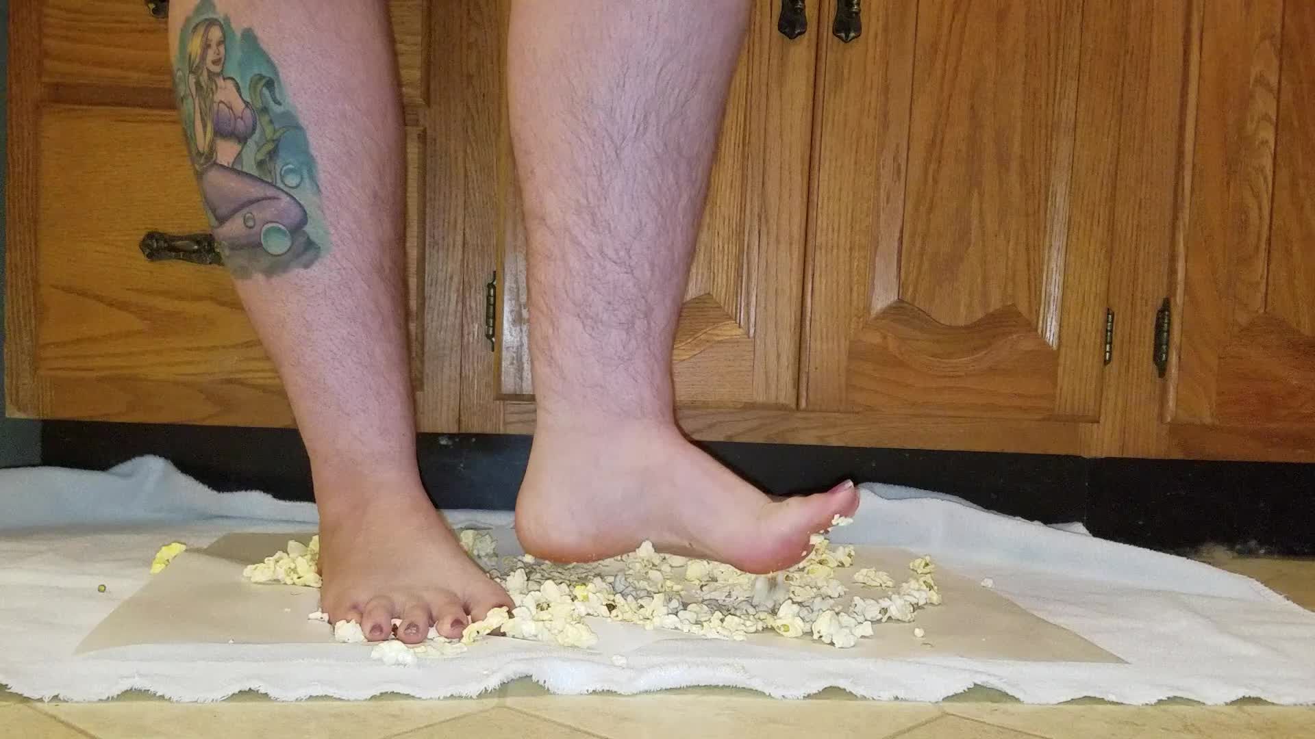 Crushing popcorn with my big feet