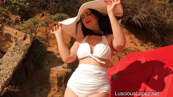 Luscious Lopez white swimsuit and hat