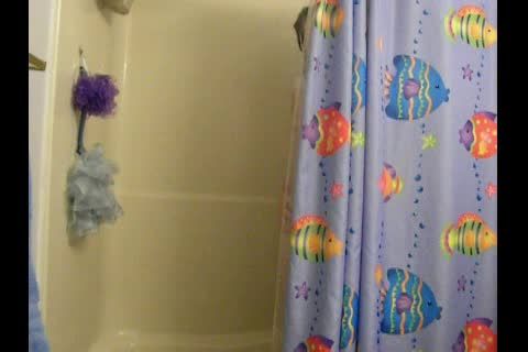 Kat takes a hot shower and cums hard